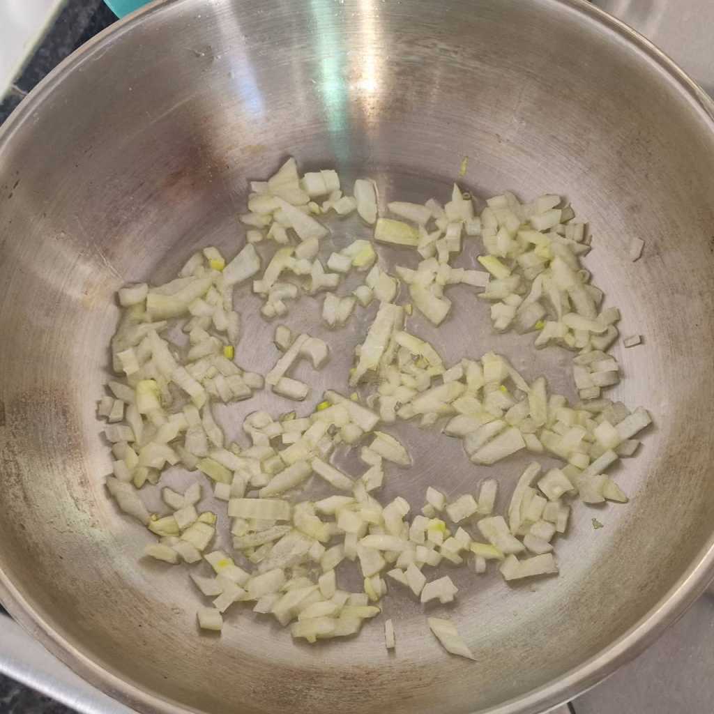 chopped onion frying in olive oil