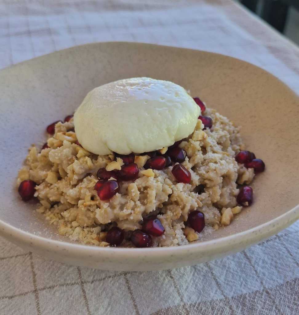 Savory Oatmeal with a Poached Egg, Parmesan cheese, pomegranate seeds recipe