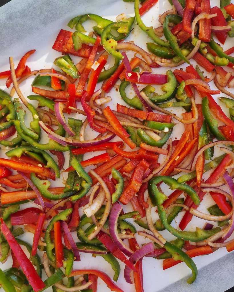 bell peppers and onion for Sheet Pan Shrimp Fajitas recipe 