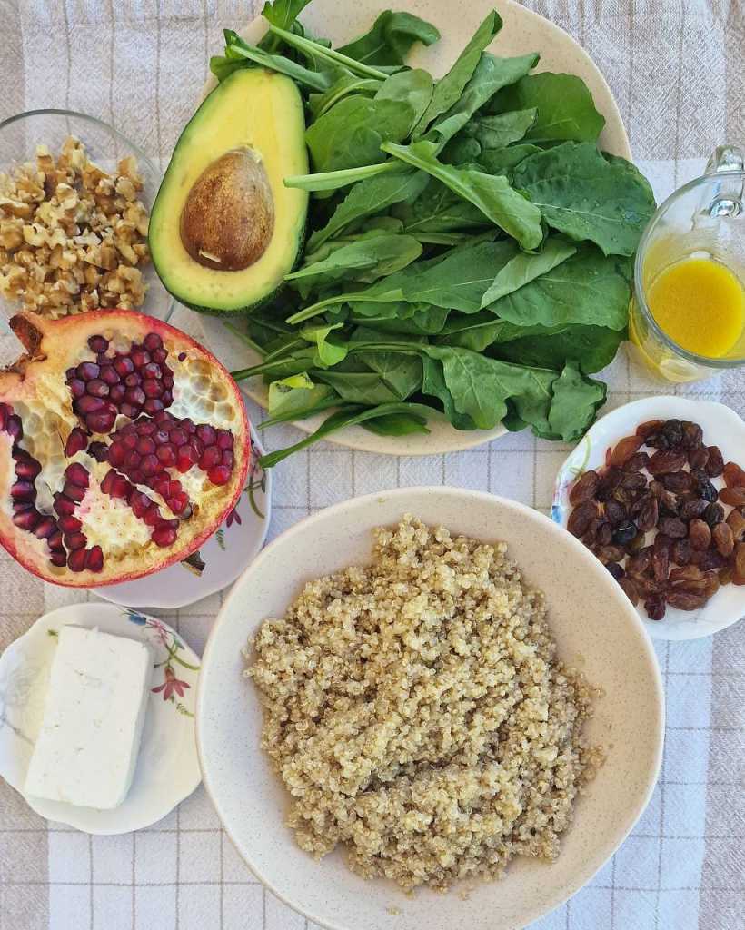 Superfoods Quinoa Salad with walnuts, raisins, avocado and feta cheese ingredients