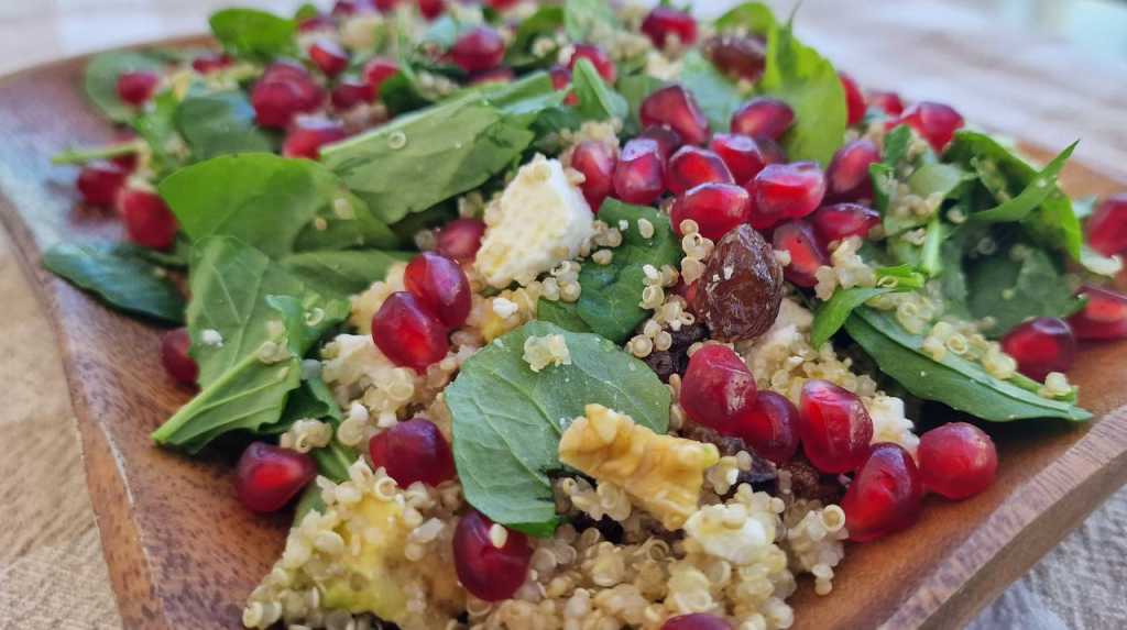 Superfoods Quinoa Salad with walnuts, raisins, avocado and feta cheese