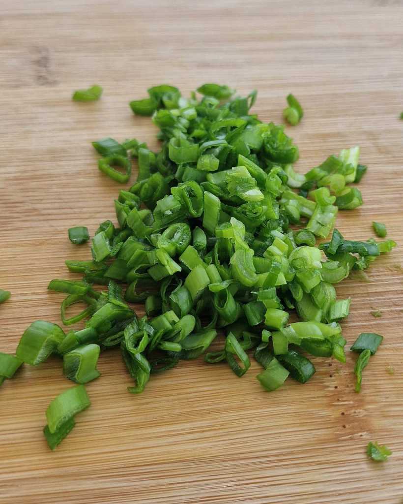 chopped scallions for Tuna Tartare with Mango and Prawn Crackers recipe