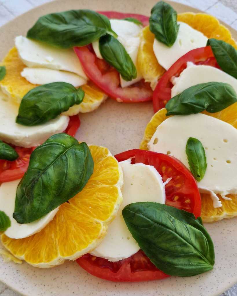 citrus caprese salad with orange, tomato, mozzarella, basil leaves recipe 