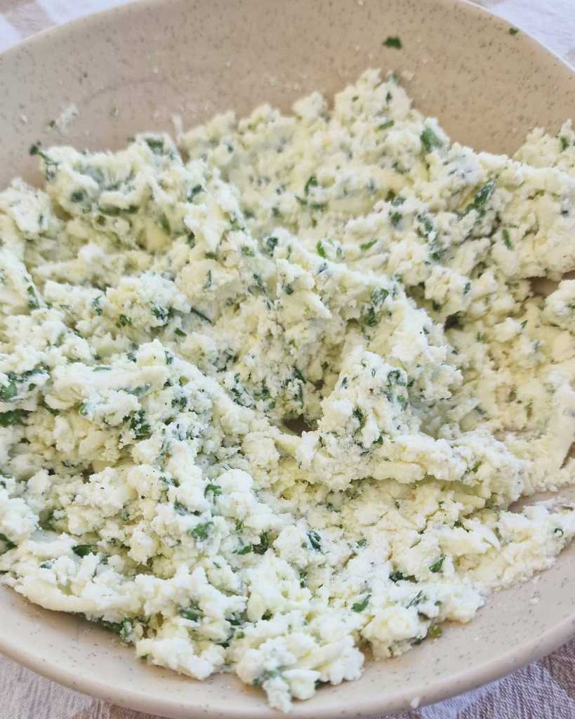 filling from ricotta, Parmesan, Mozzarella, garlic, cilantro, oregano