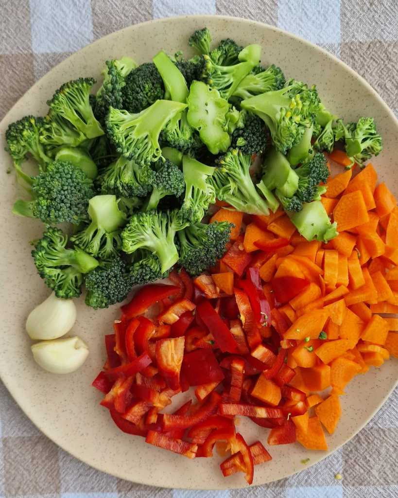 cut broccoli, carrots and long sweet pepper