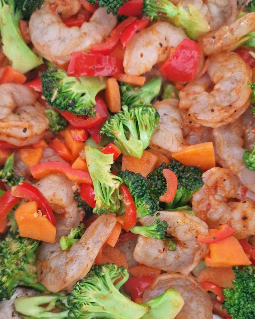vegetables and shrimp in wok
