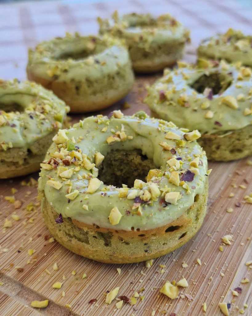 baked pistachio donuts with pistachio chocolate glaze