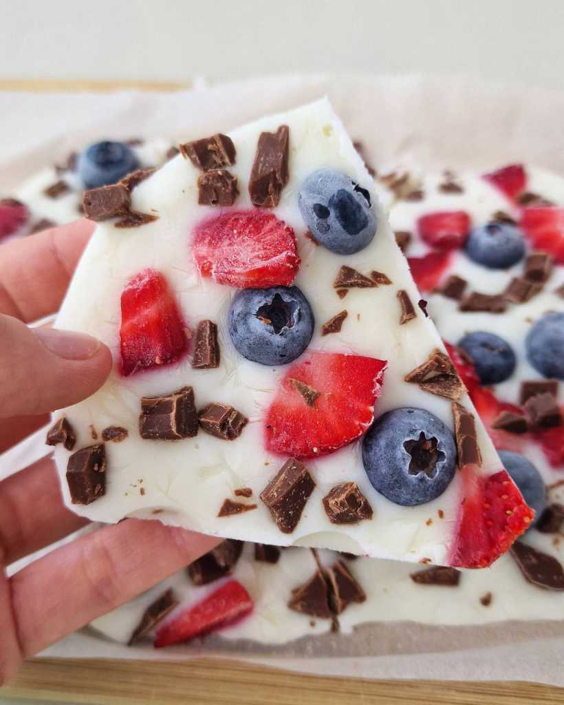 Frozen Yogurt Bark with blueberries and strawberries