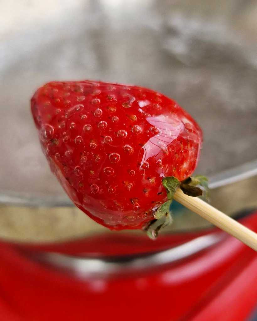 Strawberry in sugar syrup