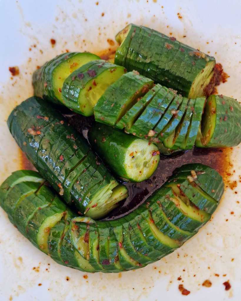 making Spicy Cucumber Salad