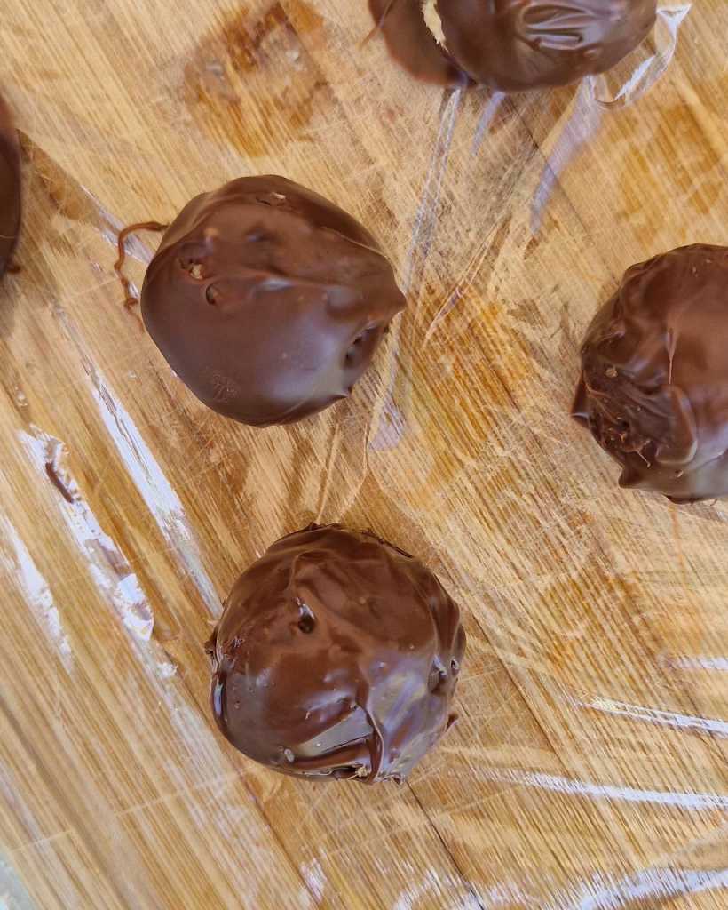 Chocolate-coated Peach Coconut balls