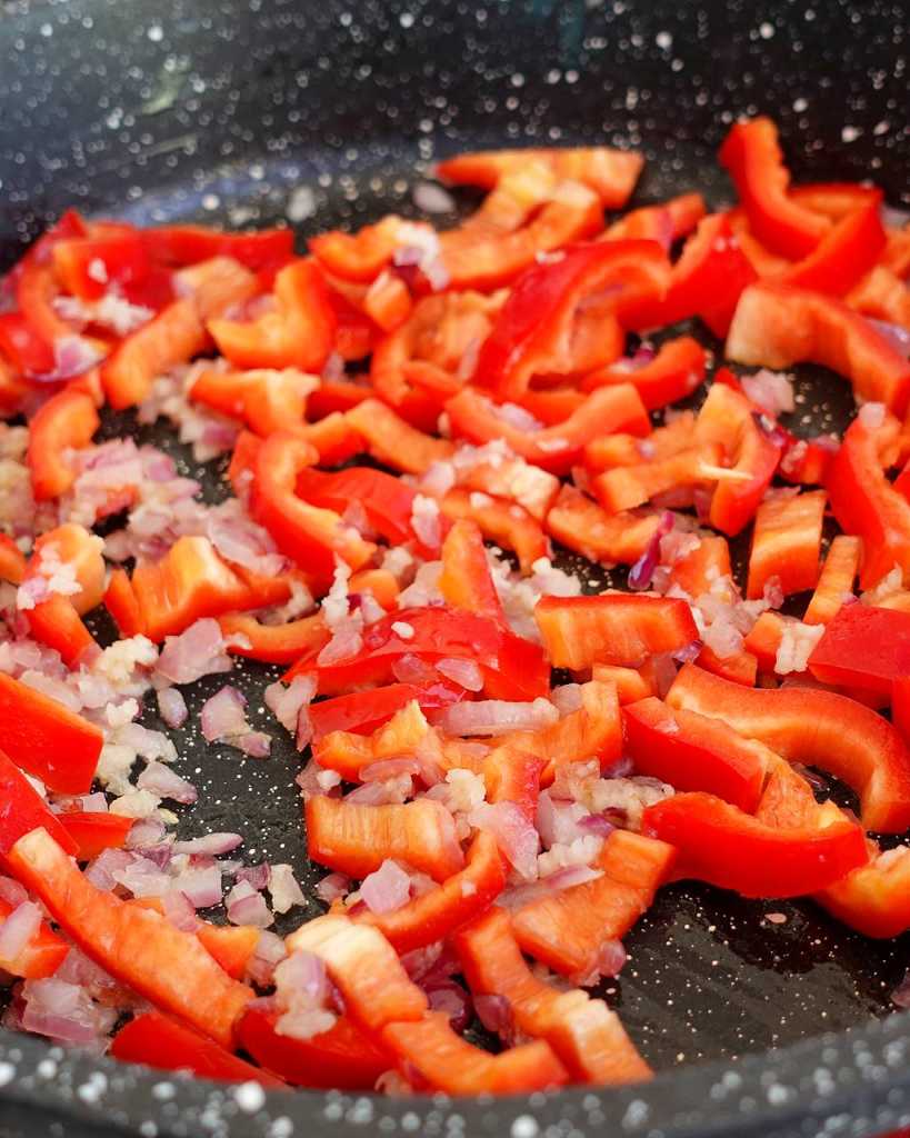 cooking Shrimp Stew with bell peppers