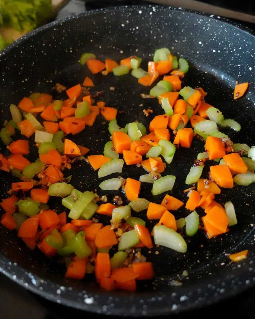 cooking carrot and celery for stew